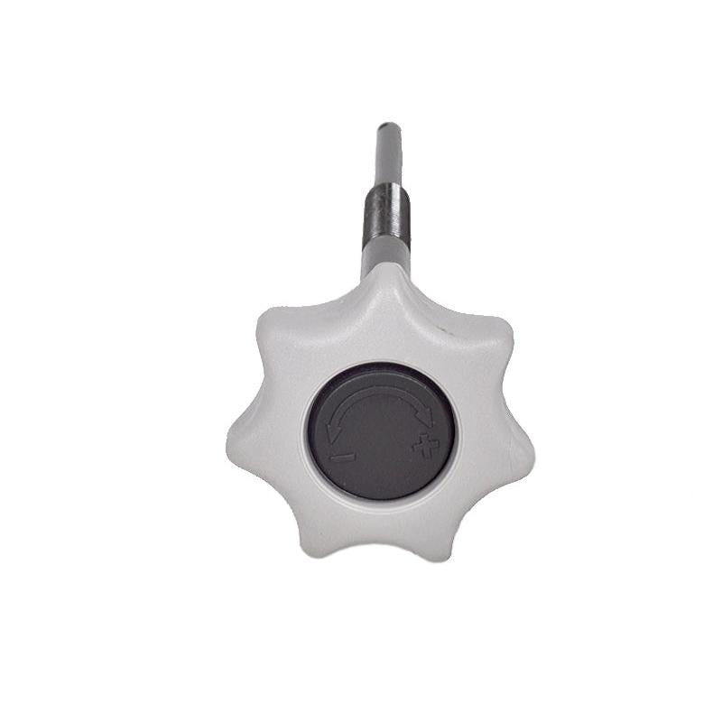 Grey star-shaped weight adjustment knob with a black center cap and metal spindle for Grammer suspension seats.