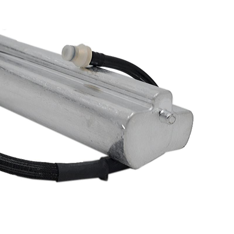 Silver metallic air reservoir for Grammer pneumatic seat suspension with attached black rubber hose and connector.