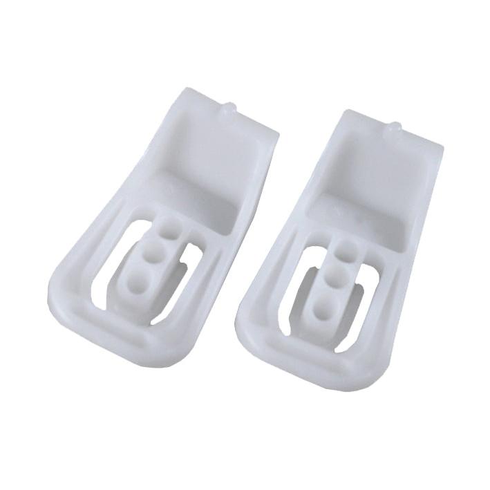 Two white plastic seat depth and tilt adjustment brackets for Grammer 2731 seats with slotted mounting holes.