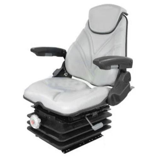 Grey heavy-duty tractor suspension seat with armrests and adjustable base for excavators and agricultural machinery.