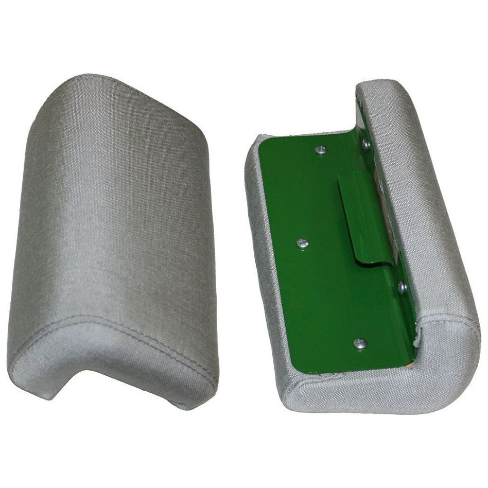 Pair of grey vinyl tractor seat armrest cushions with green powder-coated metal clip-on frames.