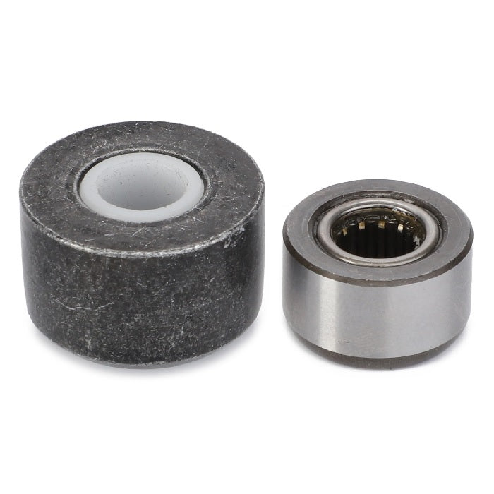 Grammer tractor seat suspension service kit with one large steel roller and one small needle bearing roller.
