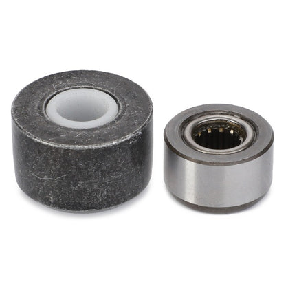 Grammer tractor seat suspension service kit with one large steel roller and one small needle bearing roller.