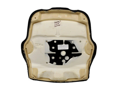 Back view of a black vinyl Grammer seat backrest cushion with a molded foam frame and central mounting plate.