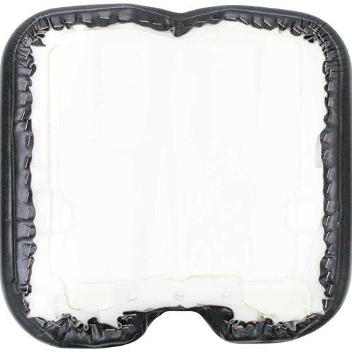 Underside of a black waterproof vinyl Promek pilot seat cushion with white contoured foam and metal mounting staples.