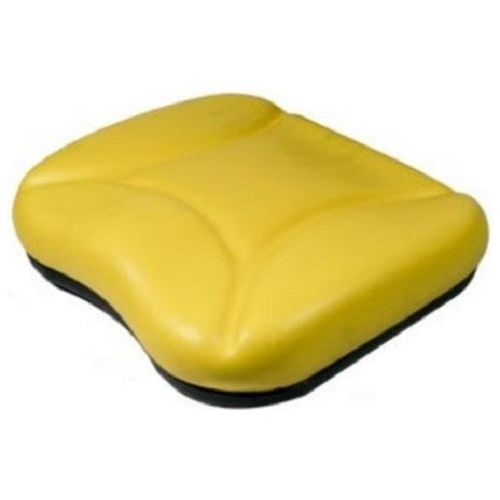Yellow vinyl replacement seat cushion with contoured foam padding for Big Boy equipment seats.