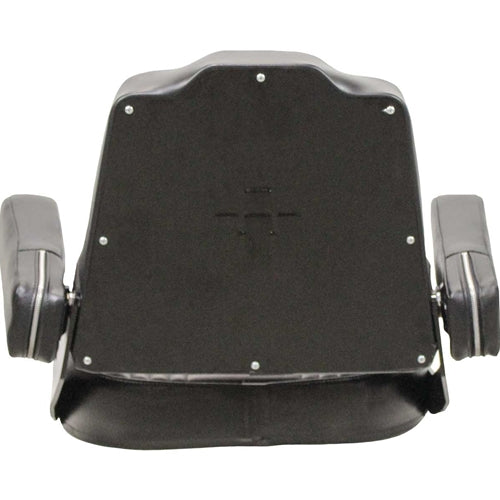 Black vinyl tractor seat assembly with tombstone backrest, folding armrests, and stamped IH logo on steel back pan.