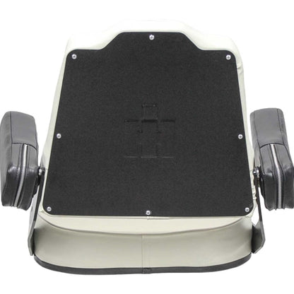White vinyl tractor seat assembly with black armrests and IH logo stamped on the backrest pan.