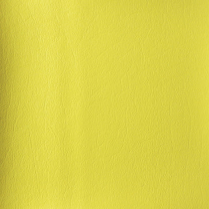 Close-up of durable yellow vinyl material with a textured grain finish for John Deere tractor seat cushions.